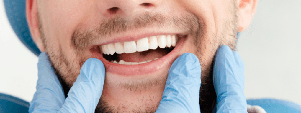 Smiling patient at Smile Lounge